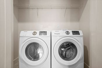 A washer and dryer in a laundry room